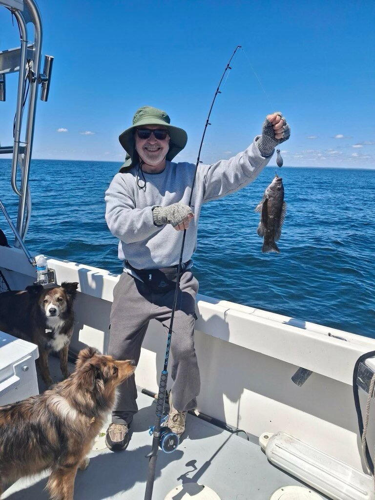 Angler on the Christina M II with a blackfish on the line