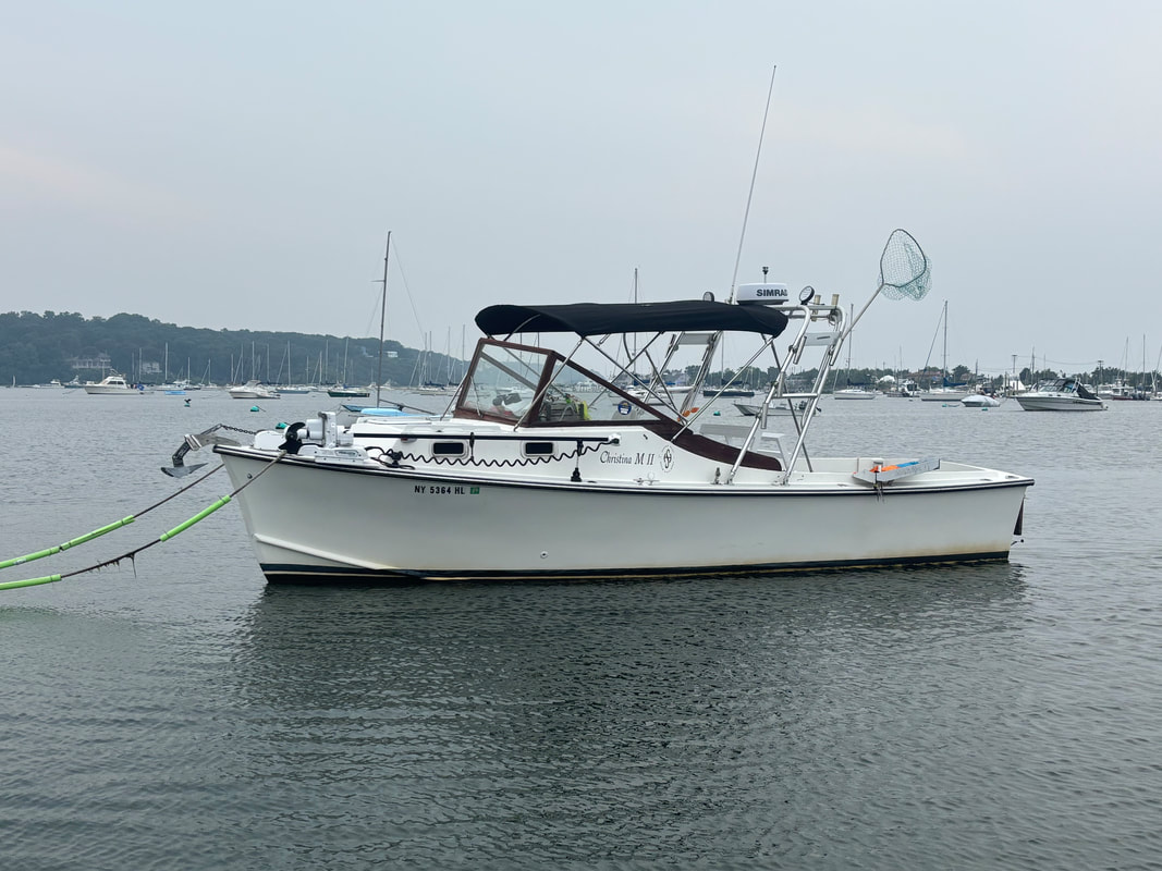 The Christina M II — a 26-foot Hunter Scott Pilot Cove Down East fishing boat at the Mount Sinai dock