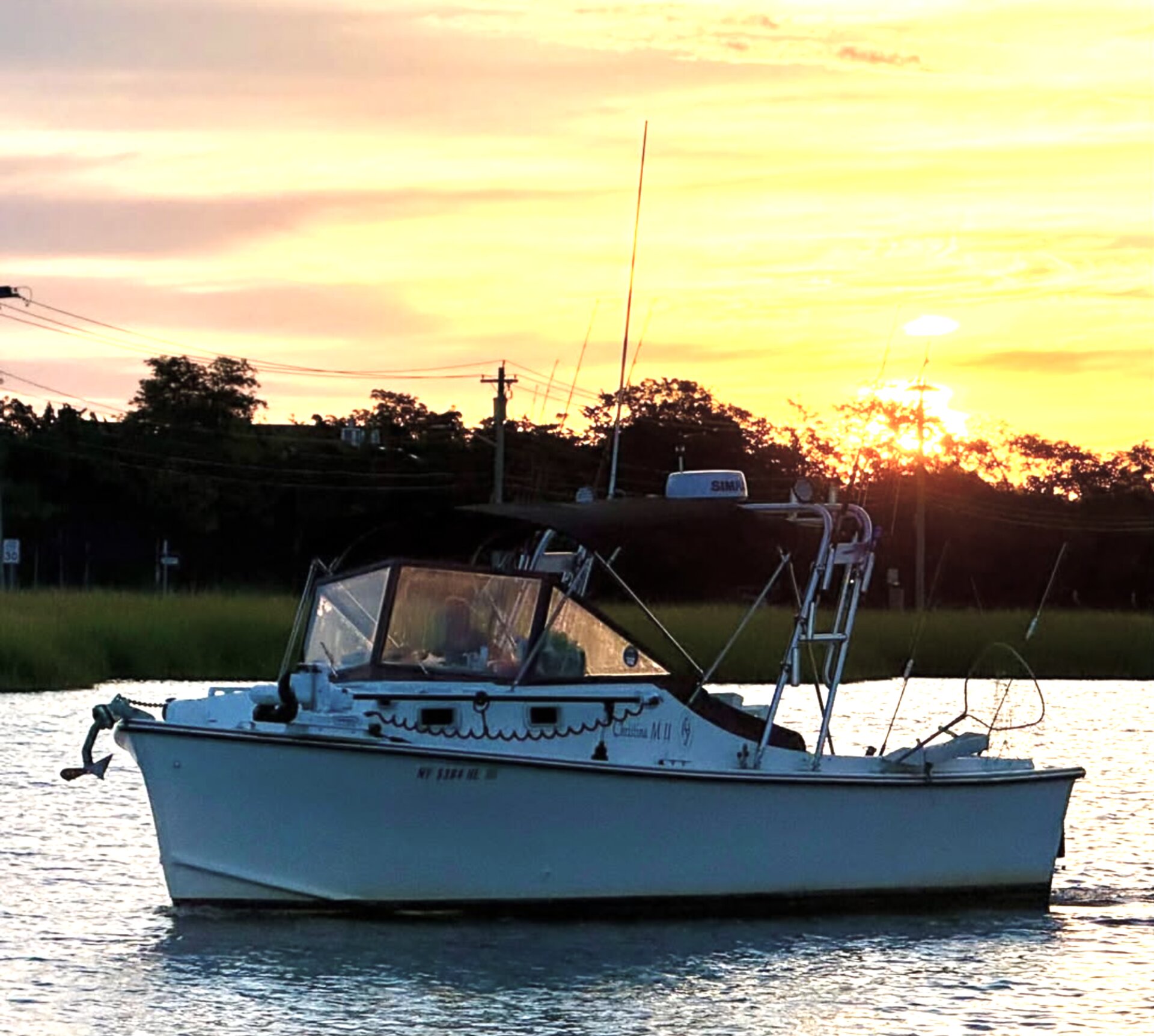 The Christina M II at sunset in Mount Sinai Harbor